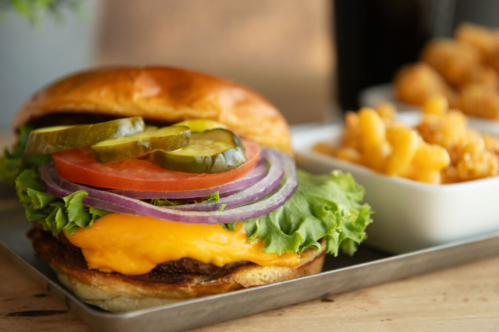 Classic Cheeseburger at all Fatpour locations with a side of tater tots