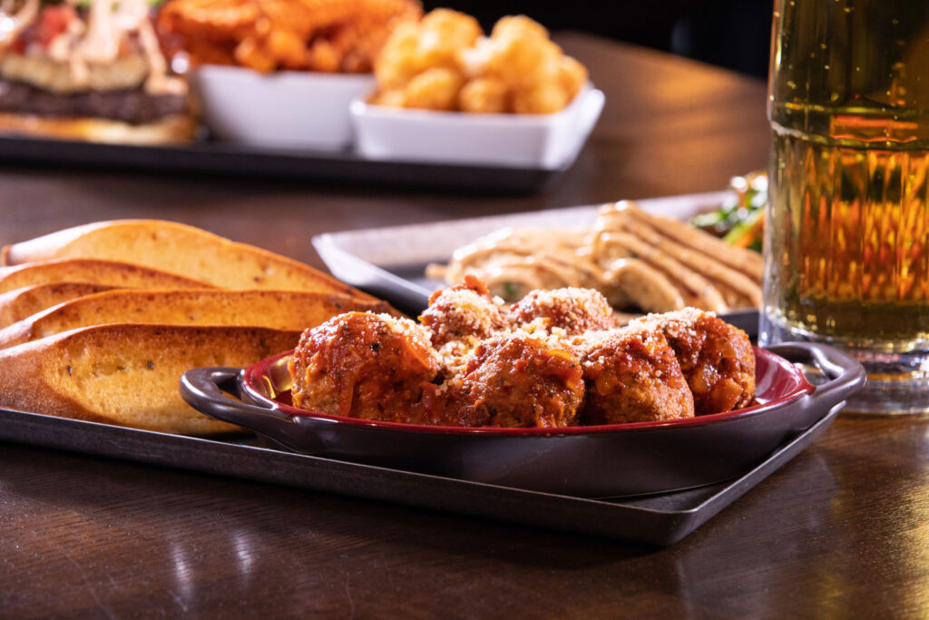 Bacon Meatballs - One of our best sellers: 

Pork, beef and bacon meatballs, spicy amatriciana sauce, garlic toast points
House Specialty