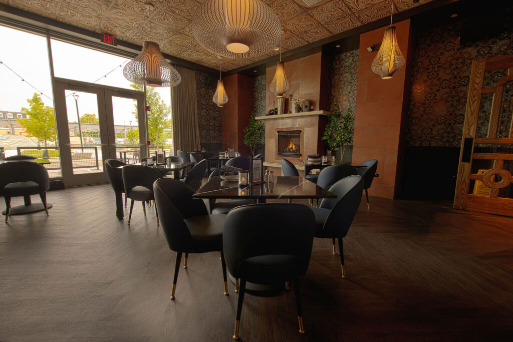 Private dining roomw ith fireplace and access to outdoor patio dining at Fatpour Lincolnwood
