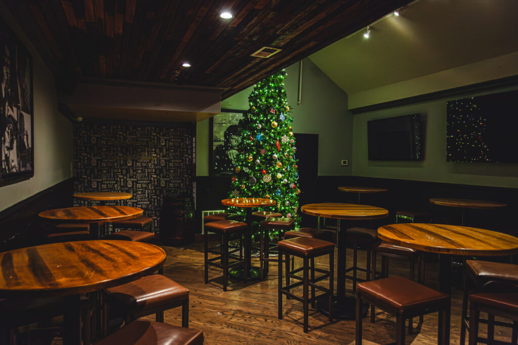 Morrison private dining room for events with Santa, holiday movie son the TV, holiday-themed cocktails, and custom holiday playlists