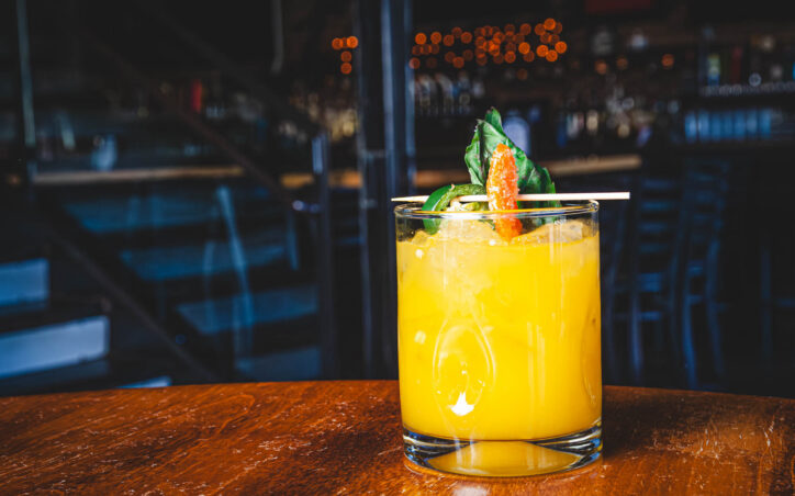 Bad Date Escape Plan Spring & Summer cocktail - casamigos tequila, triple sec, mango purée, lime juice, simple syrup, jalapeño, basil leaves