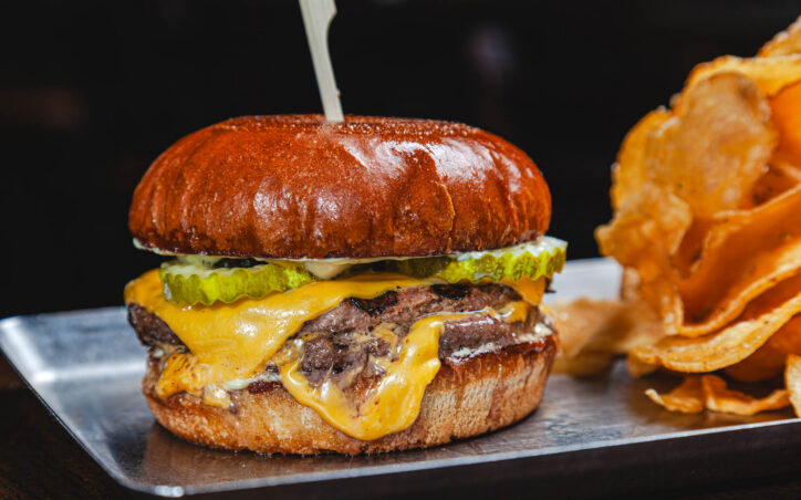 Classic Smash Burger - double smash patty, american cheese, house pickles, dijonnaise, buttery bun