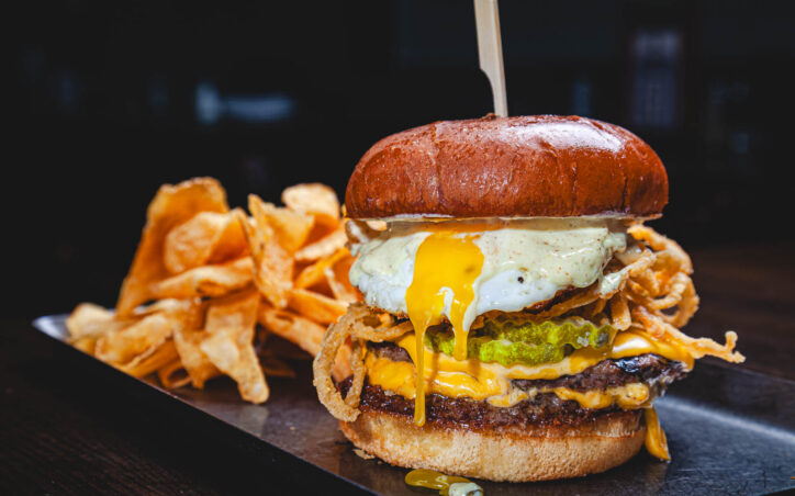 Fatpour smash burger - double smash patty, bacon jam, american cheese, fried egg, crispy onions, house pickles, dijonnaise, buttery bun