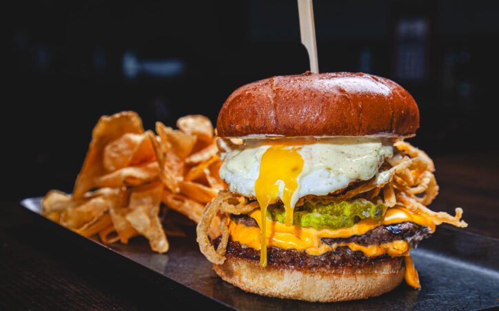 Fatpour smash burger - double smash patty, bacon jam, american cheese, fried egg, crispy onions, house pickles, dijonnaise, buttery bun