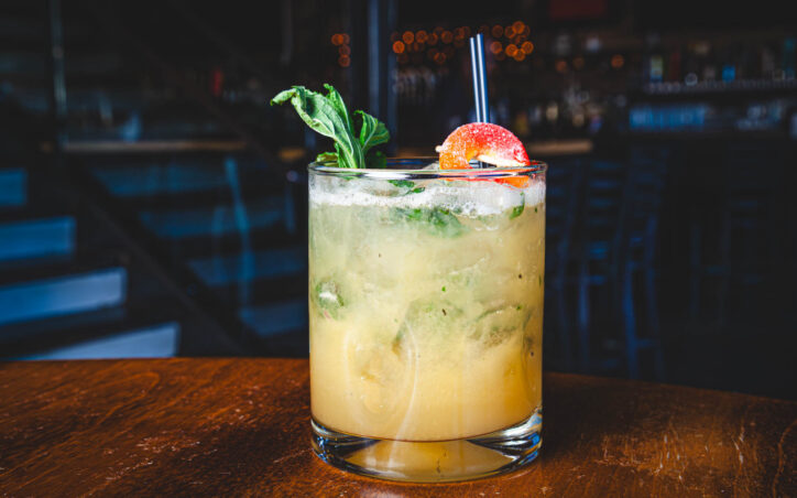 Peach me How To Dougie - four roses bourbon, peach purée, lemon juice, mint leaves