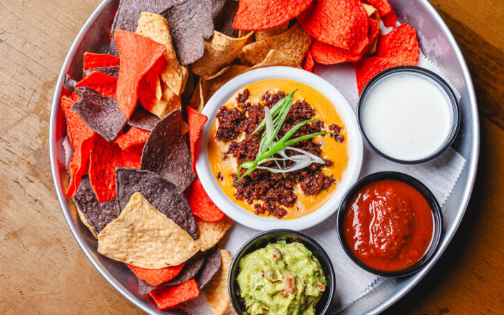 World Cup Food Special - Pitch Please Dip: rTricolored tortilla chips, chorizo, beer queso, sour cream, guacamole and fire roasted tomato salsa for just $15.95
